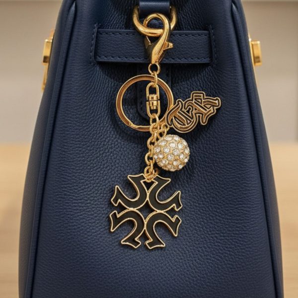 True Religion Brand Jeans Gold-Tone Charm Keychain and Bag Charm. Item #5056